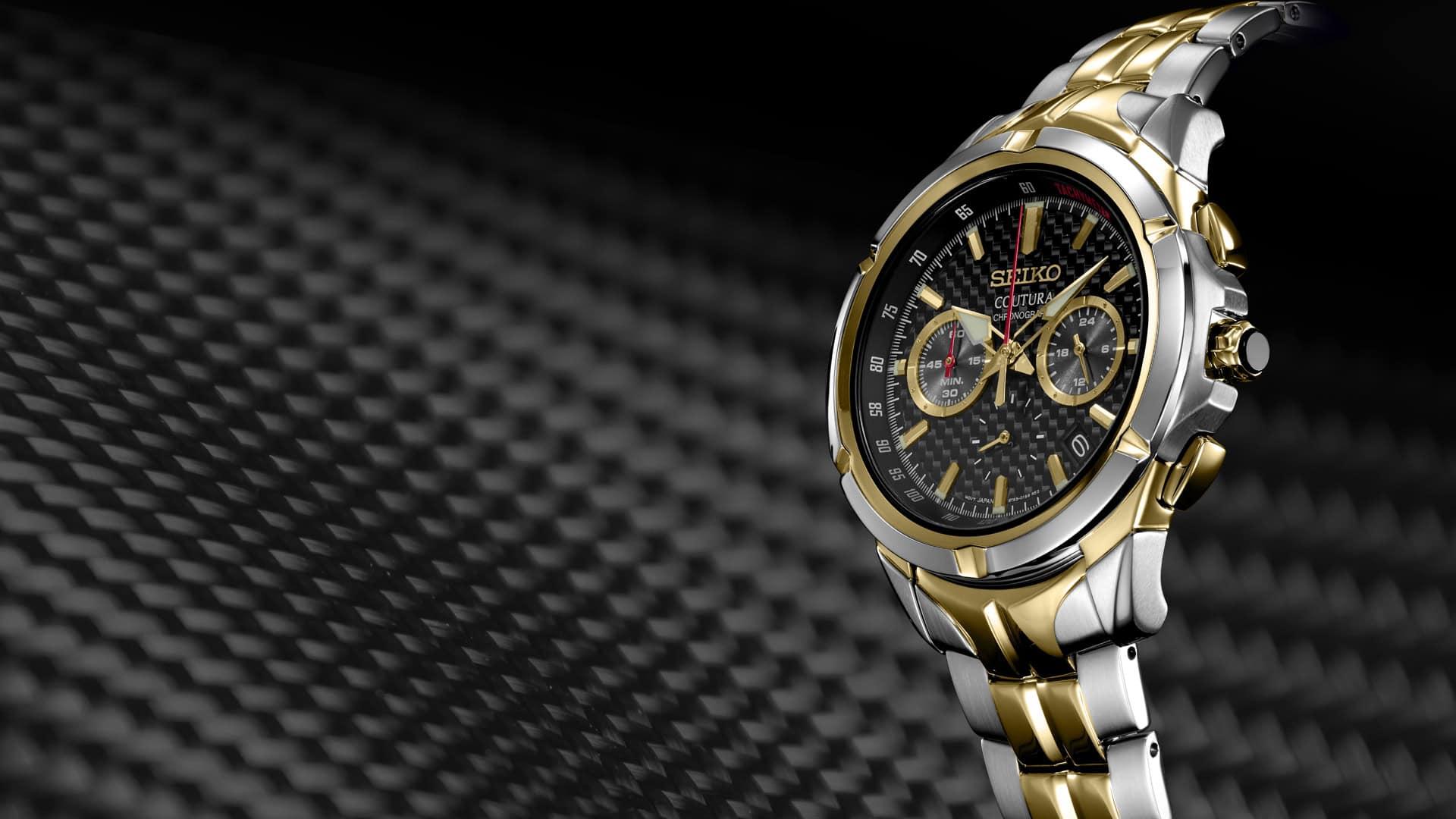 Luxury Seiko Coutura gold and stainless steel watch with chronograph features.