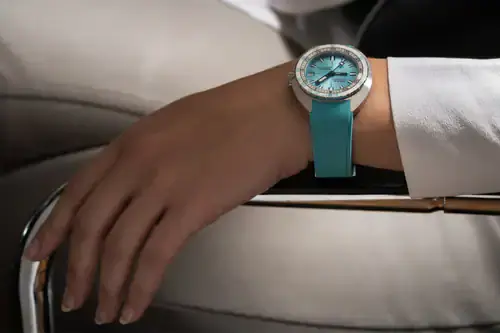 Luxurious Doxa Watch with turquoise strap and stylish dial.