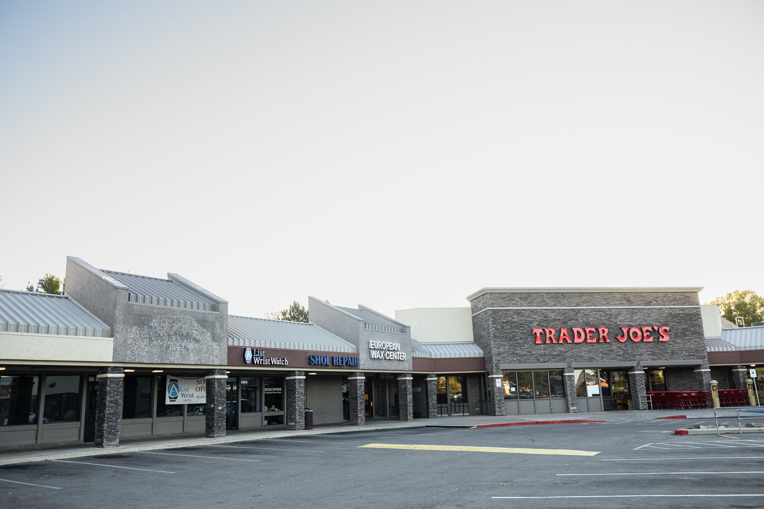 A-List Wrist Watch storefront in shopping center with neighboring stores.