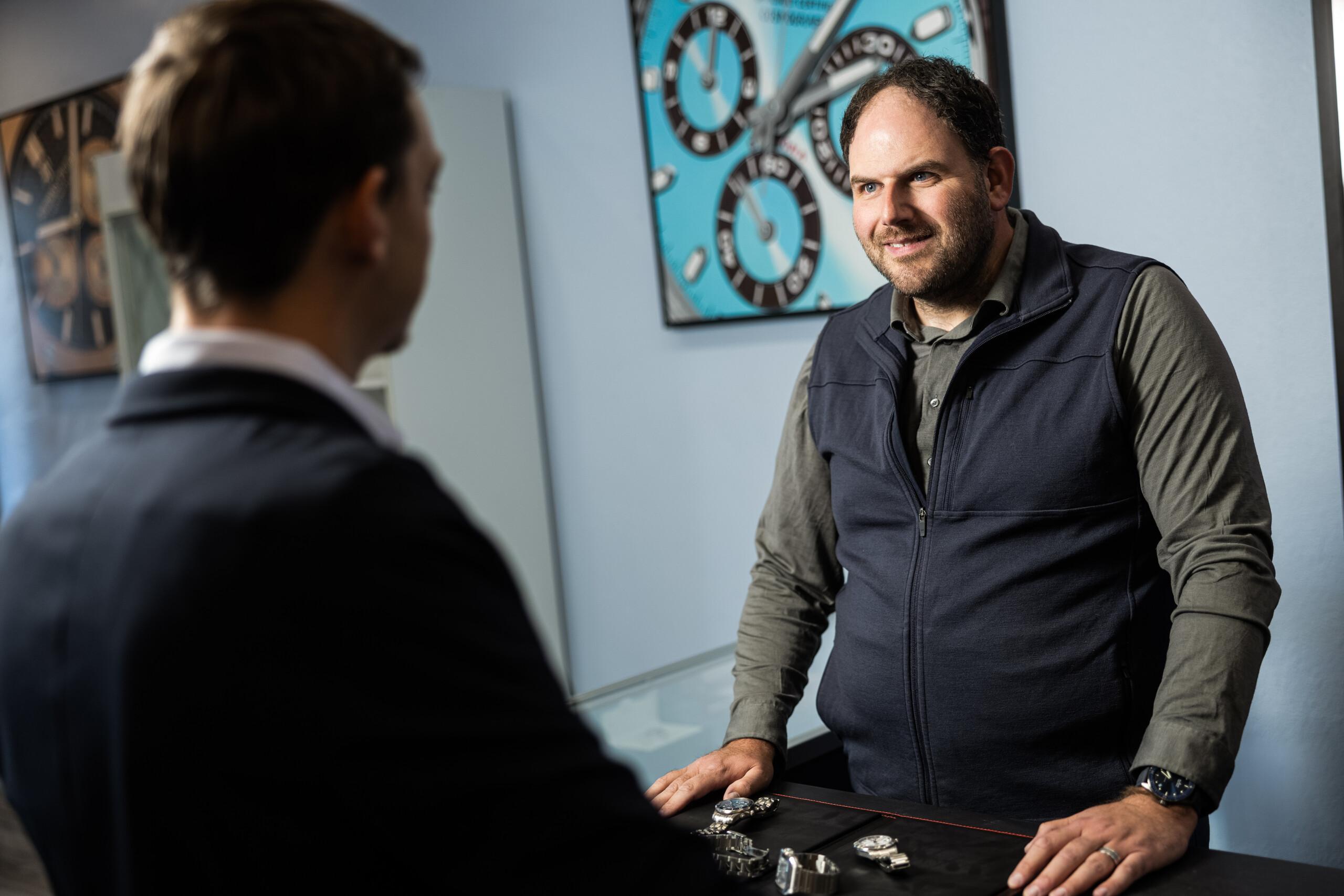 Luxury A-List wrist watch displayed in a high-end boutique.