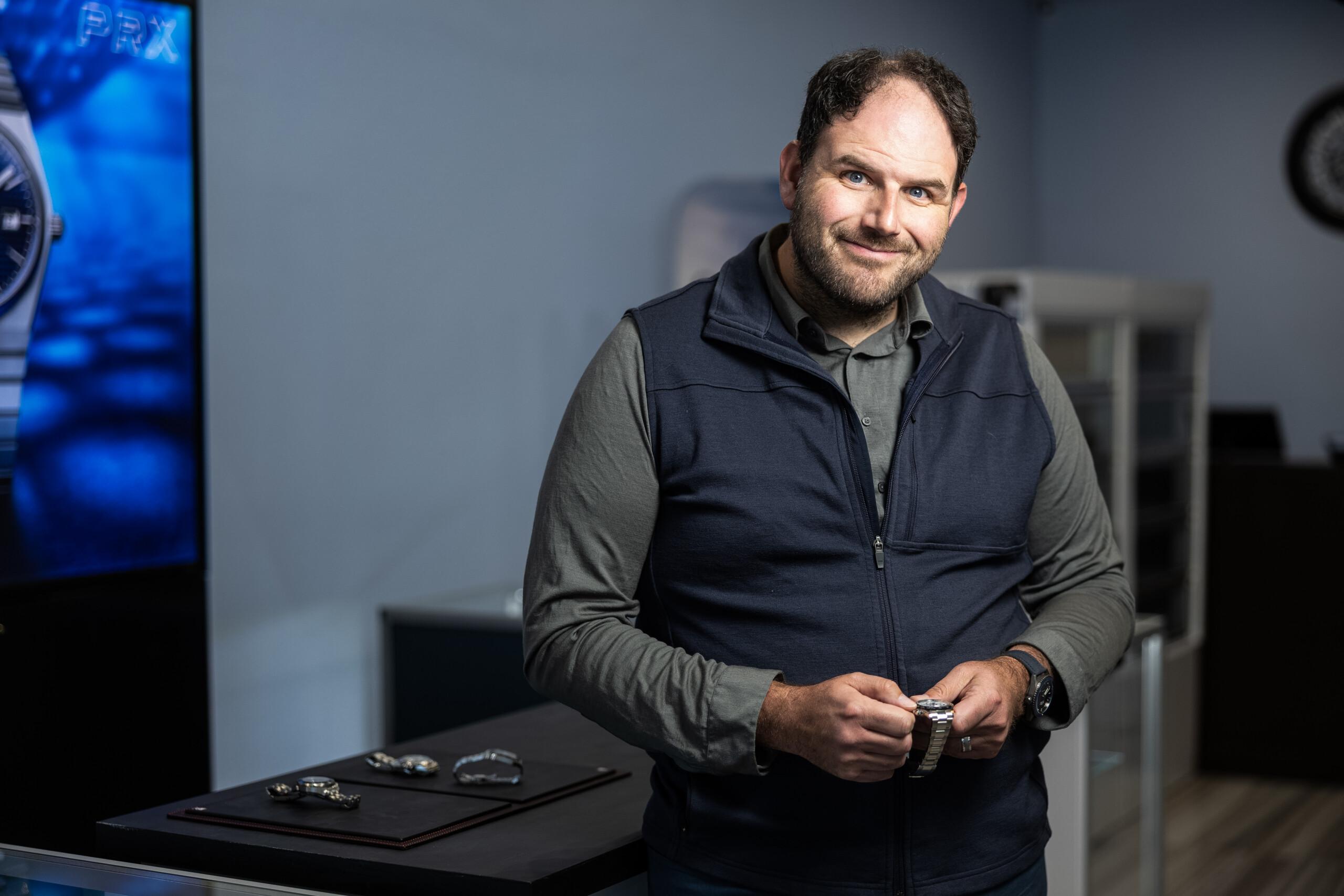 Luxury men's wrist watch with stainless steel band and sophisticated design.