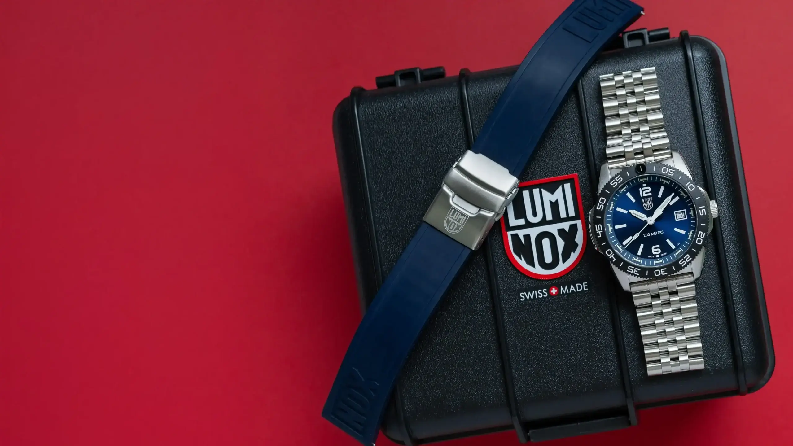 High-end Luminox wristwatch with stainless steel band on black case, luxury watch repair.